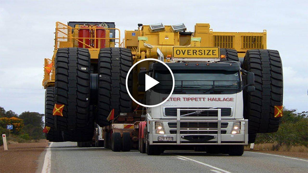 Oversized Incredibly Heavy Machines Carried by Trucks Cover